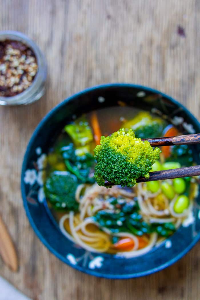 Close Up of Broccoli in Chopsticks