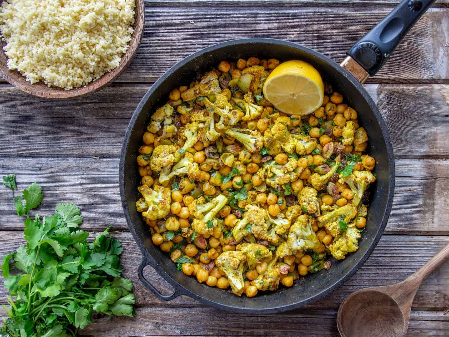 Chickpea Cauliflower Couscous in black frying pan