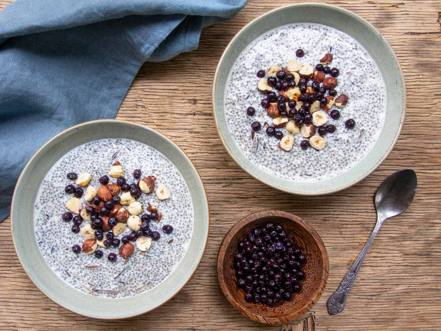 Chia pudding topped with berries hazelnuts