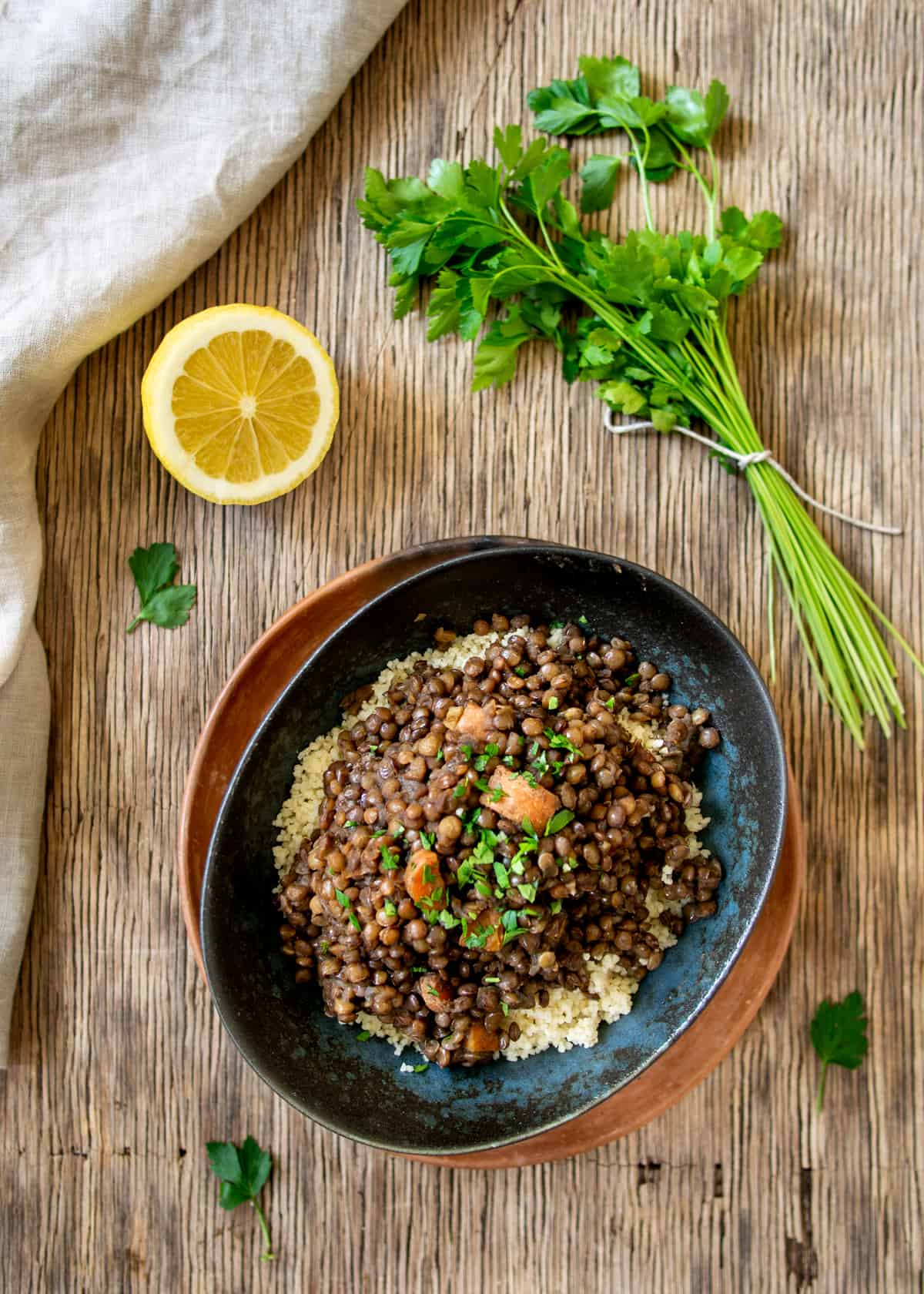 French Lentil Stew in Blue Bowl Parsley and Lemon On The Side
