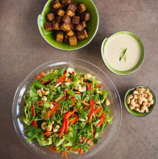 Asian style salad with baked Tempeh and a Ginger Sesame Dressing
