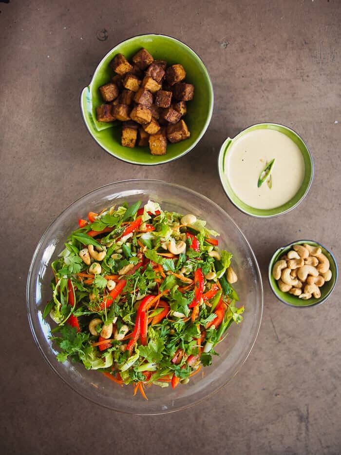 Asian style salad with baked Tempeh and a Ginger Sesame Dressing
