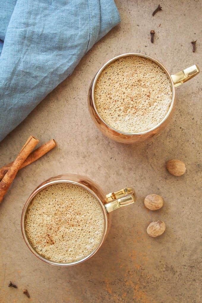 Pumpkin Spiced Latte in Copper Mugs with Cinnamon and Cloves