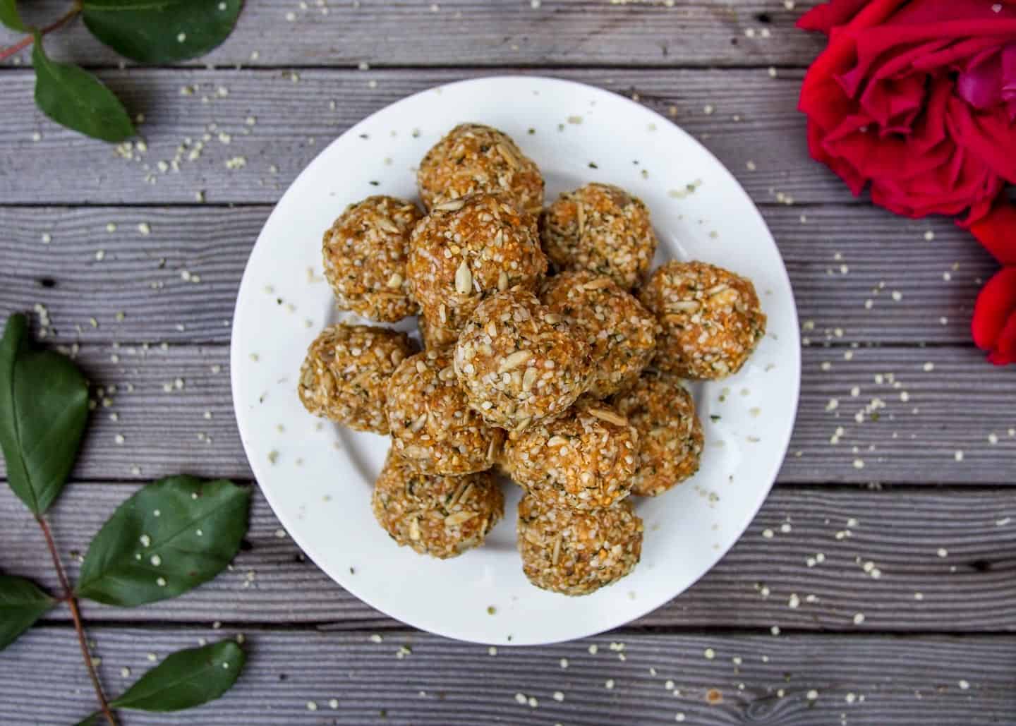 High Protein Balls Recipe Stacked On White Plate