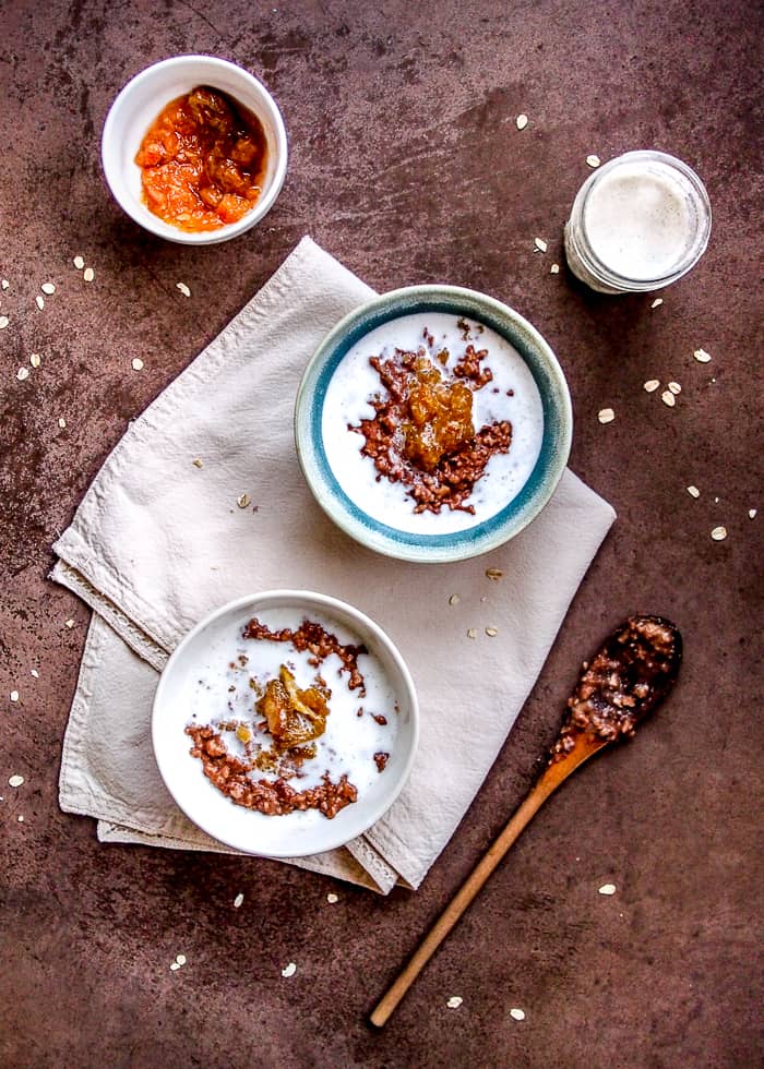 Orange Chocolate Oatmeal in Bowls on White Linen