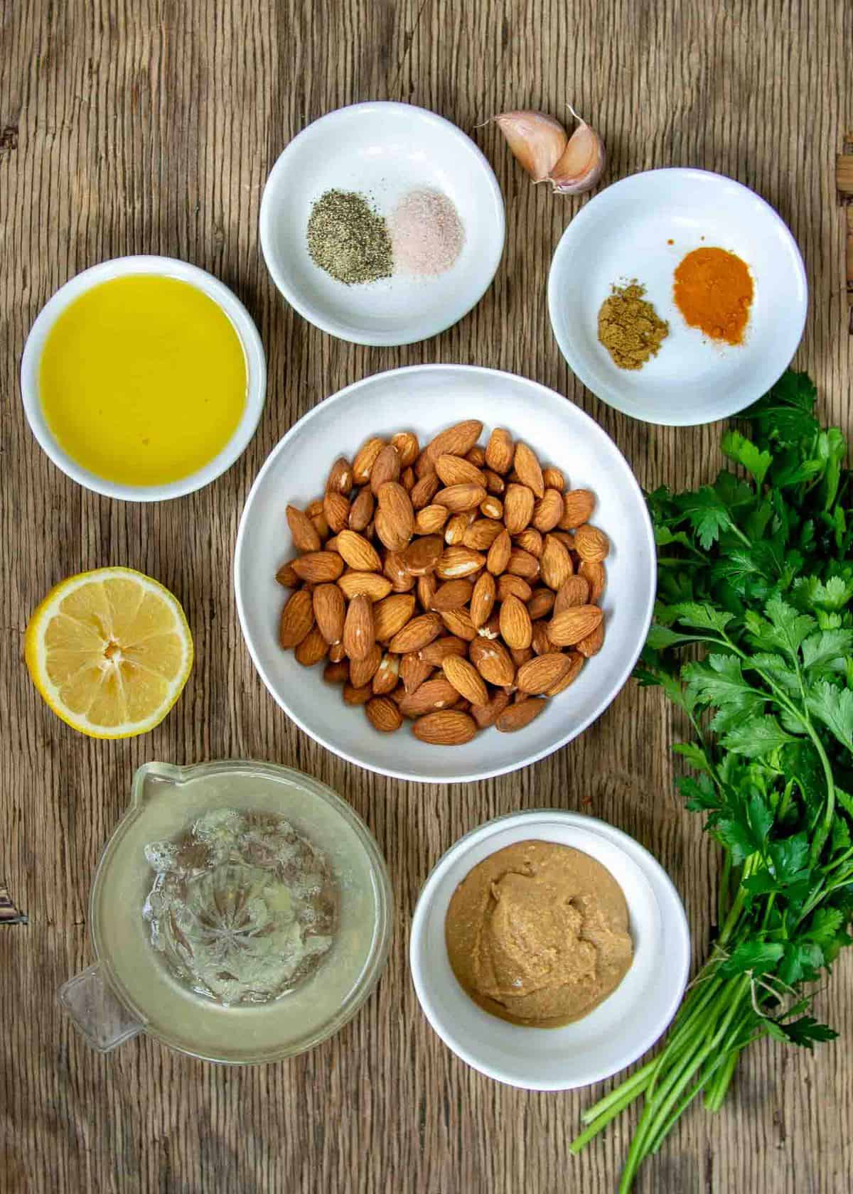 Ingredients for Raw Almond Dip: Almonds, Lemon, Tahini, Spices and Olive Oil