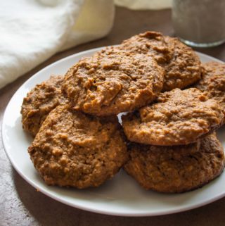 Feature Three Ingredient Peanut Butter Cookies Stacked on White Plate