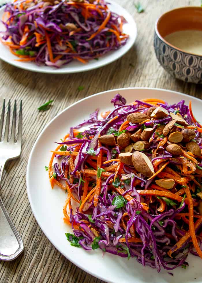Close Up Purple Cabbage and Carrot Salad on White Plate