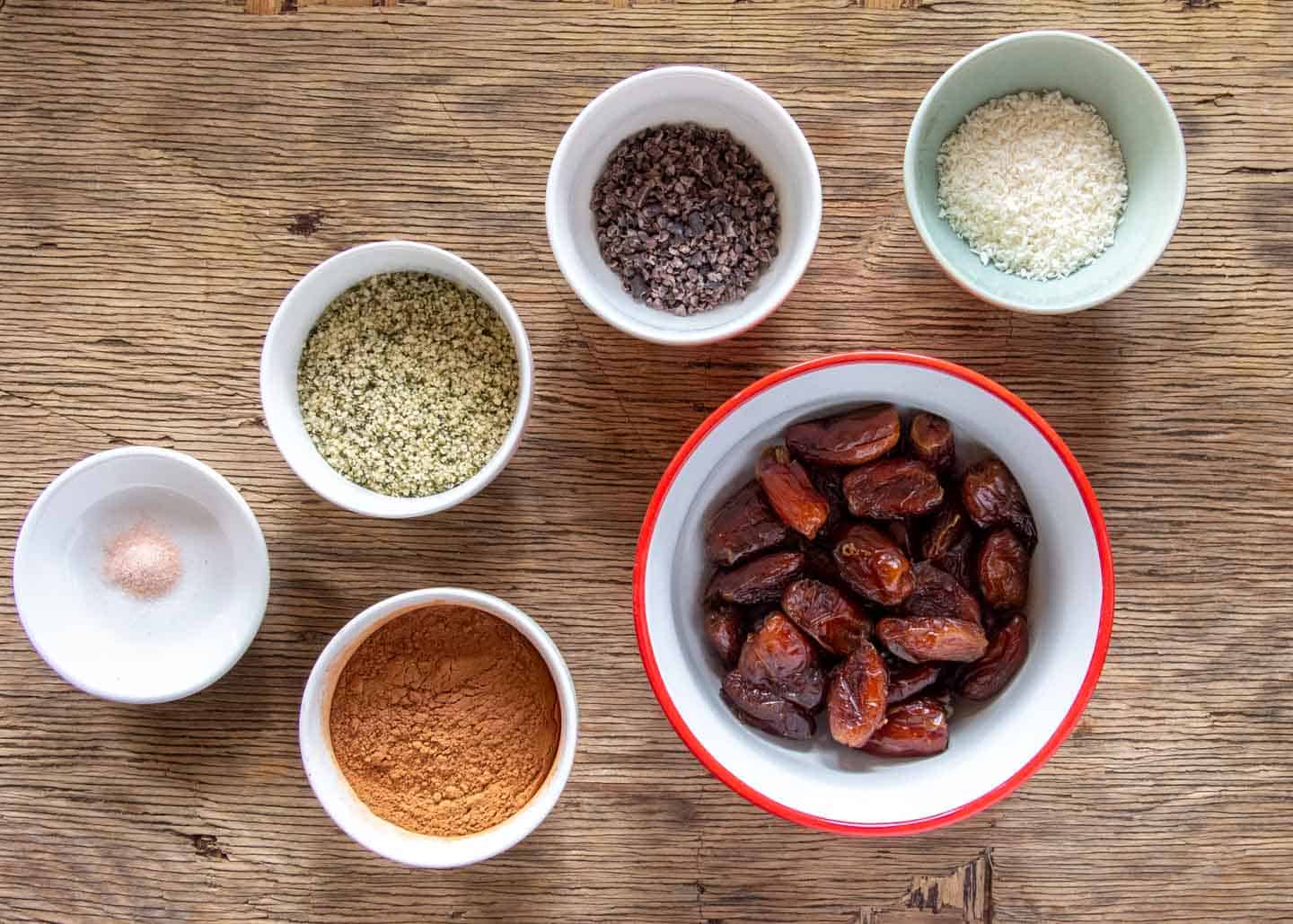 Ingredients for Raw Date Bars: Dates, Hemp, Cacao Powder, Cacao Nibs, Coconut, Salt