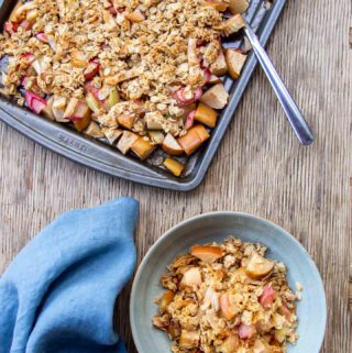 Roasted Rhubarb Apple Crisp in Blue Bowl with Baking Tray